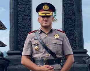 Kompol Robby Topan Manusiwa SIK.